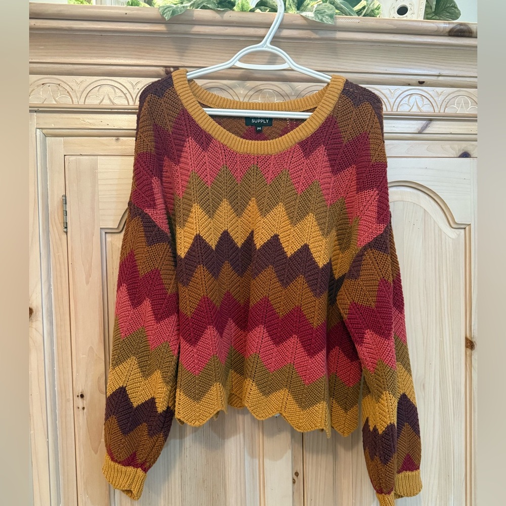 Known Supply Size M Chevron sweater.
